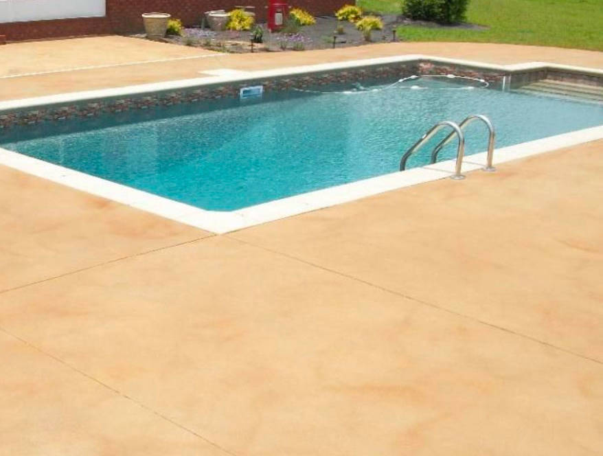 Tinted and stained outdoor pool residential concrete topping