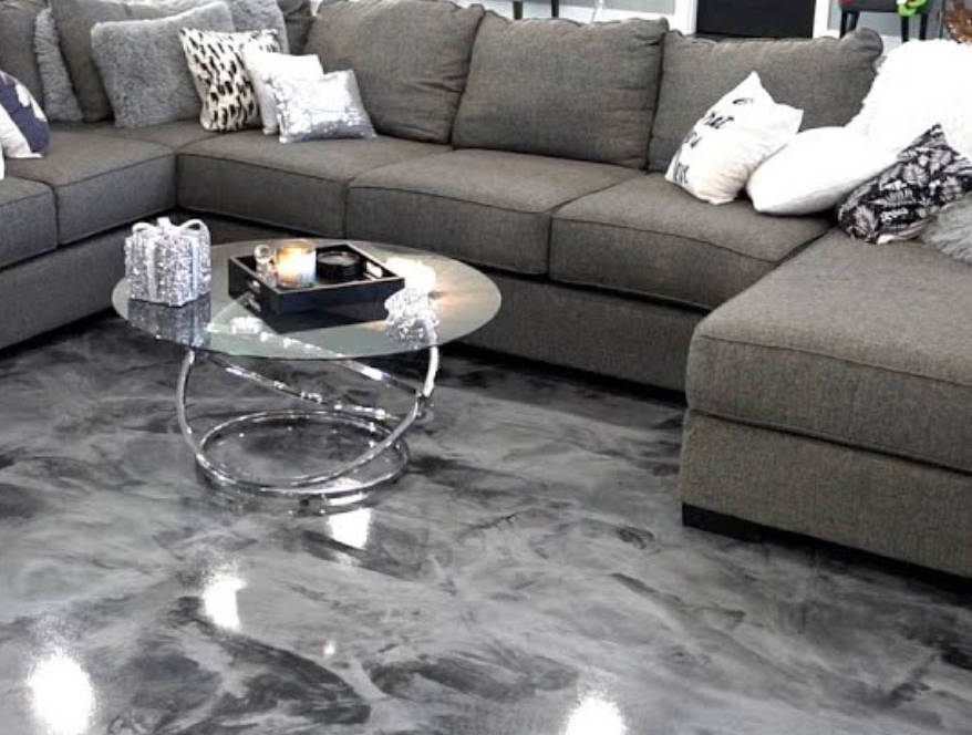 Residential resinous flooring with black and grey epoxy swirled design